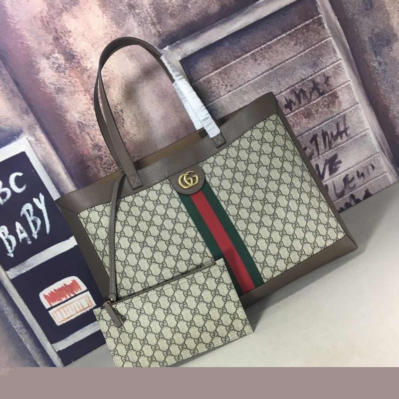 G*u*i shopping bags
